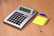 Calculadora,papel y boli
