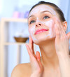 Beautiful Woman Applying Natural Homemade Facial Mask