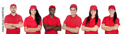 Photo: Team of workers with red uniform Team of workers with red uniform