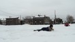 children paly soccer in the snow