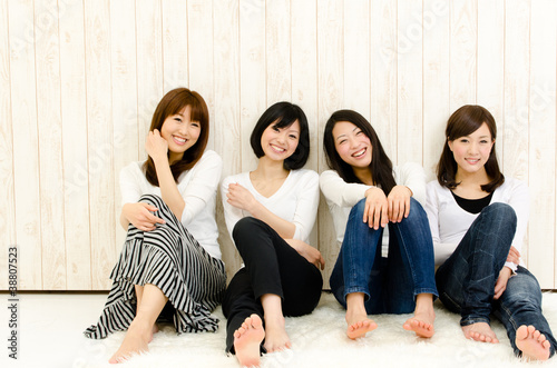 Photo: attractive asian women relaxing attractive asian women relaxing