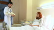 Redhead women gets her newborn baby