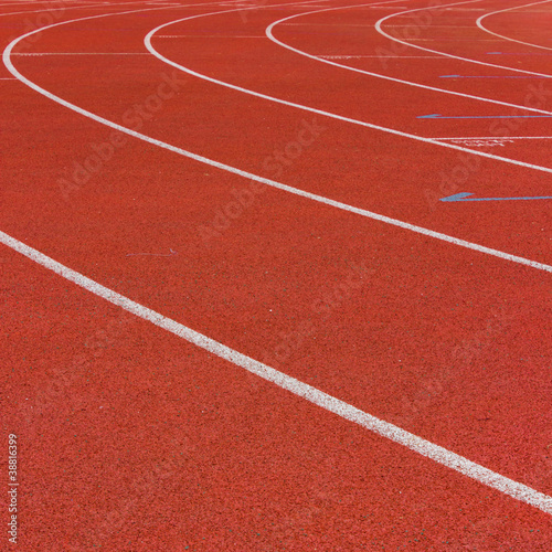 Photo: Curve of a Red Running Track Curve of a Red Running Track