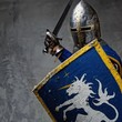 Medieval knight in attack position.