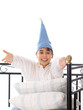 smiling boy in pajama and nightcap