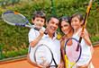 Family playing tennis
