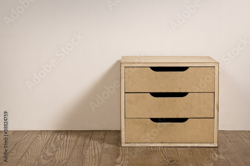 Foto: Old room interior with chest drawer. Old room interior with chest drawer.