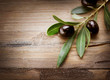 Photo: Olives on a Wood background Olives on a Wood background