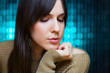 Photo: Girl posing in front of glowing background Girl posing in front of glowing background