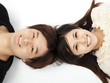 Photo: young lovely couple lying floor and looking the camera young lovely couple lying floor and looking the camera