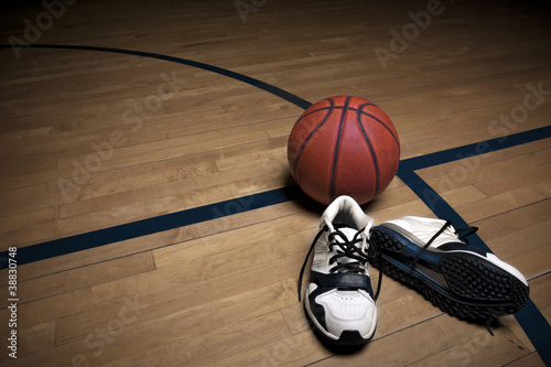 Photo: Basketball Court with ball and shoes Basketball Court with ball and shoes