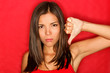 Unhappy thumbs down woman