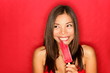 Girl eating ice popsicle