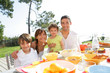 Foto: Family breakfast in the garden Family breakfast in the garden