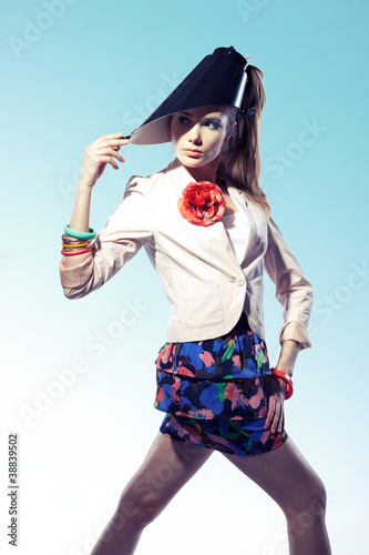 Photo: Young woman wearing futuristic headwear Young woman wearing futuristic headwear