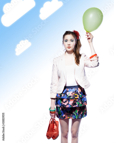 Photo: Funny girl with a balloon Funny girl with a balloon