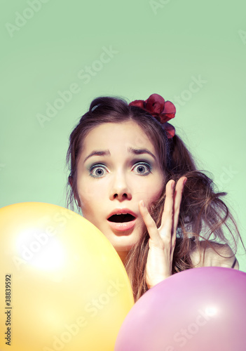 Photo: Wondered girl with balloons Wondered girl with balloons