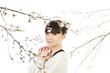 Beautiful woman and cherry blossom