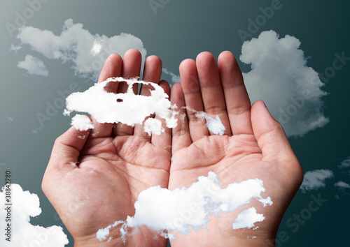 Photo: cloud car in hands cloud car in hands