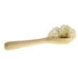 cooked rice on a wooden spoon cooked rice on a wooden spoon