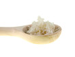 cooked rice on a wooden spoon cooked rice on a wooden spoon