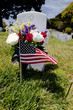 Headstone and American Flag at National Cemetery