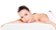 Foto: Woman relaxing in spa salon Woman relaxing in spa salon