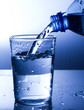 Photo: Pouring fresh water into a glass Pouring fresh water into a glass
