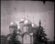 Montage of Moscow churches clips, vintage b&w 8mm footage.