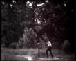 Man turning on the fountain, vintage b&w 8mm footage