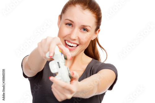 Photo: Playing girl with a game controller Playing girl with a game controller