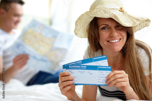 Photo: Woman with tickets Woman with tickets