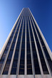 Photo: Generic office Tower rising Dozens of Floors into the Blue Sky Generic office Tower rising Dozens of Floors into the Blue Sky