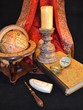 Antique globe, candle, compass, and whalebone carving