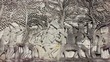 Man visiting Bayon temple, Cambodia, Asia and bas-reliefs