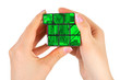 Hands with technology puzzle