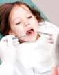 young girl have a dental examination