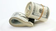 Bundle of many 100 dollar bank notes rotating Bundle of many 100 dollar bank notes rotating