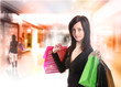 Shopping young woman in the shopping mall.