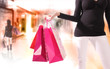 Shopping young woman in the shopping mall.