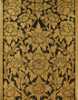 Gold damask pattern on thai temple's wall