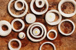 Onion rings on wooden background