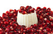 pomegranate seeds with a white fresh cheese