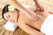 woman receiving back massage