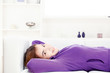 Foto: girl lying on sofa at home girl lying on sofa at home