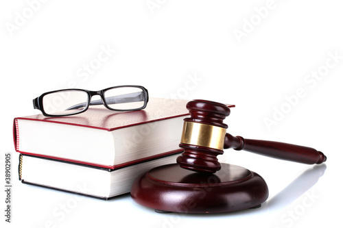 Photo: wooden gavel, glasses and books isolated on white wooden gavel, glasses and books isolated on white
