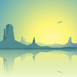 A Desert Landscape with Mountains and Reflection in Water