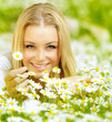 Beautiful girl enjoying daisy field Beautiful girl enjoying daisy field