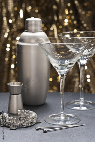 Photo: Two Martini glasses with bartender tools Two Martini glasses with bartender tools