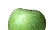 Green apple with water drops rotates on white bagkround